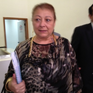 Angelina Basílio, presidente da Rosas de Ouro, deixa Deatur (Delegacia de Atendimento ao Turista) após prestar depoimento (27/2/11) 